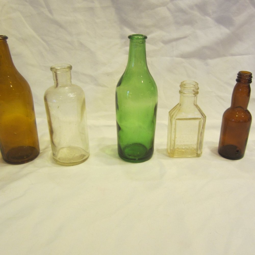 VTG SET OF 6 COLLECTIBLE GLASS BOTTLES EACH DIFFERENT